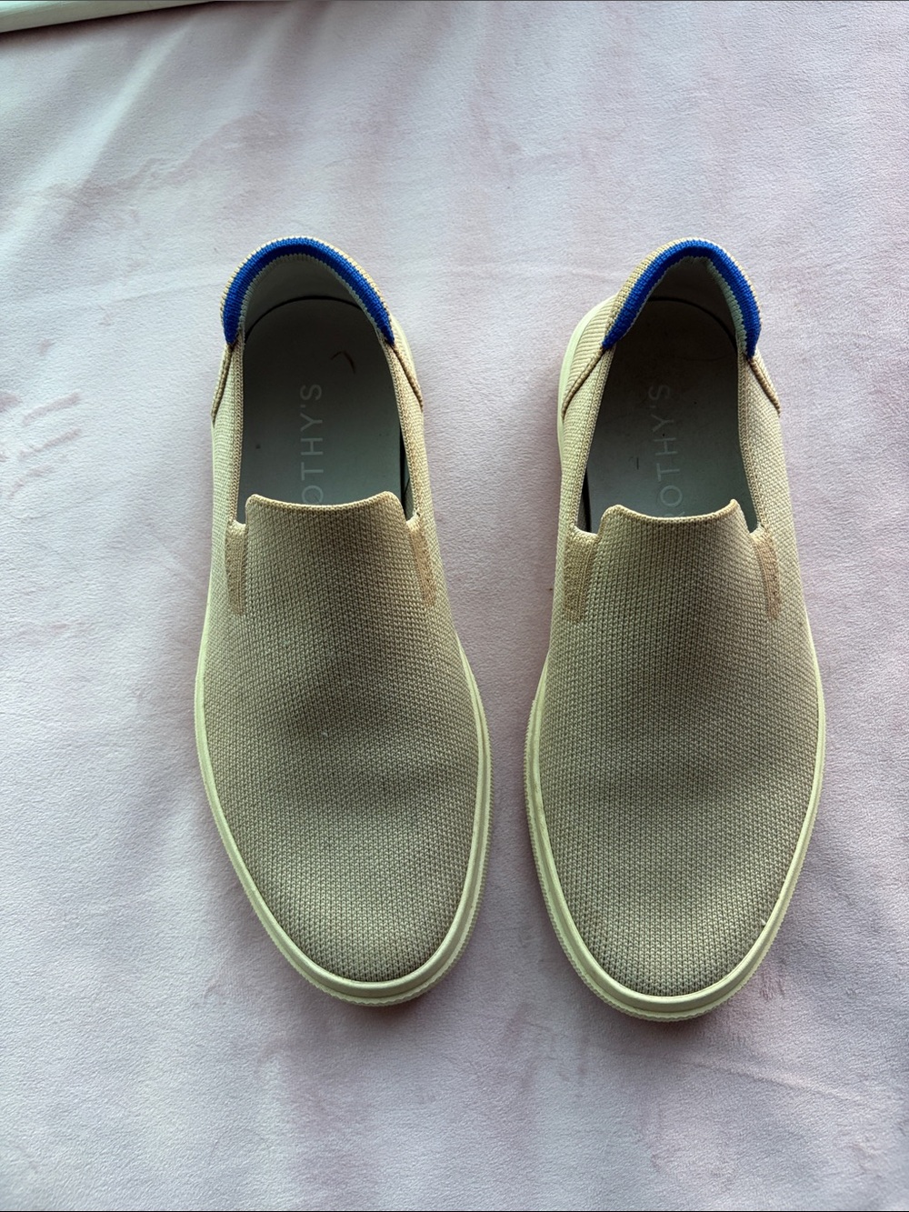 Rothy’s Beige Knit Slip-On Loafers with signature Blue Heel Trim